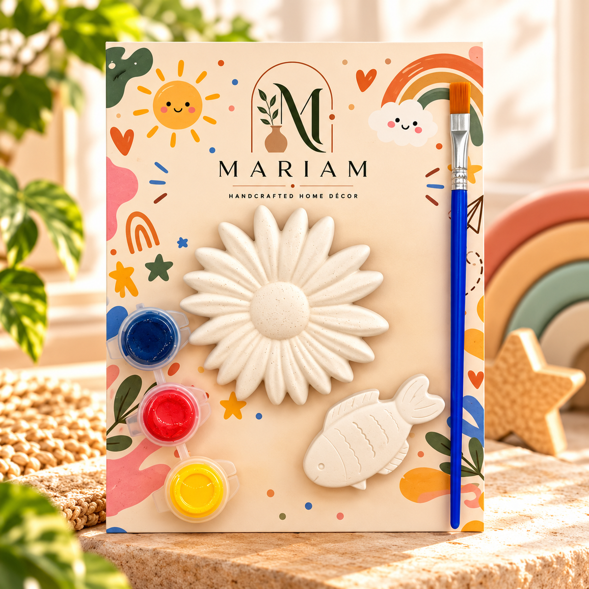 Kids painting kit with daisy and fish shapes, three paints and a brush